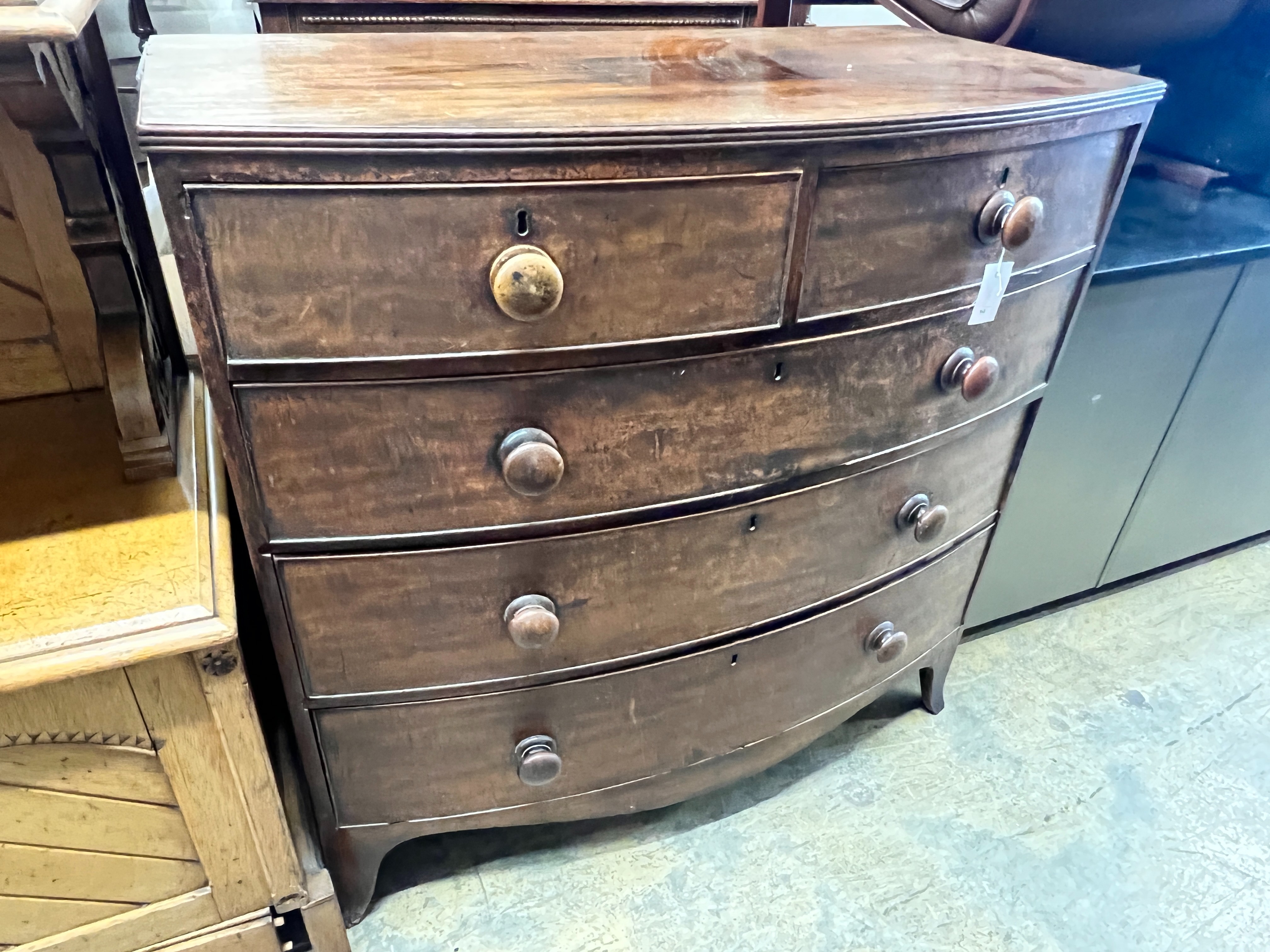 A Regency mahogany bow front chest of drawers, width 105cm, depth 55cm, height 103cm